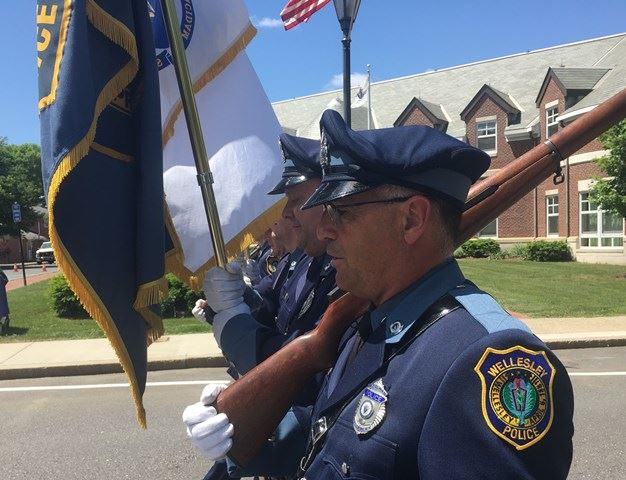 Officer Amalfi marches with the Honor Guard