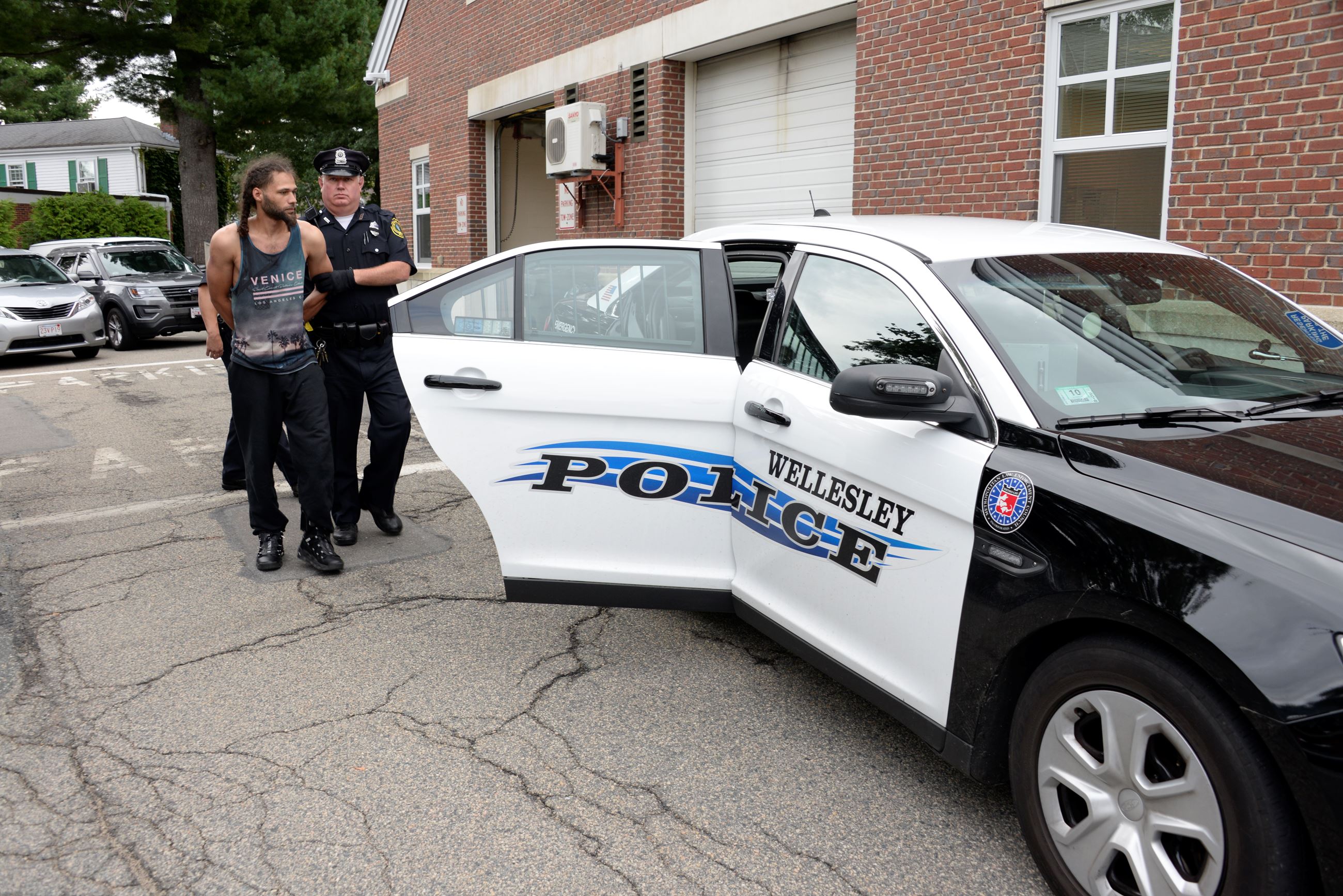 Officer Cunningham and Matthew Bradley, charged with the firearm found at Hunnewell Field.