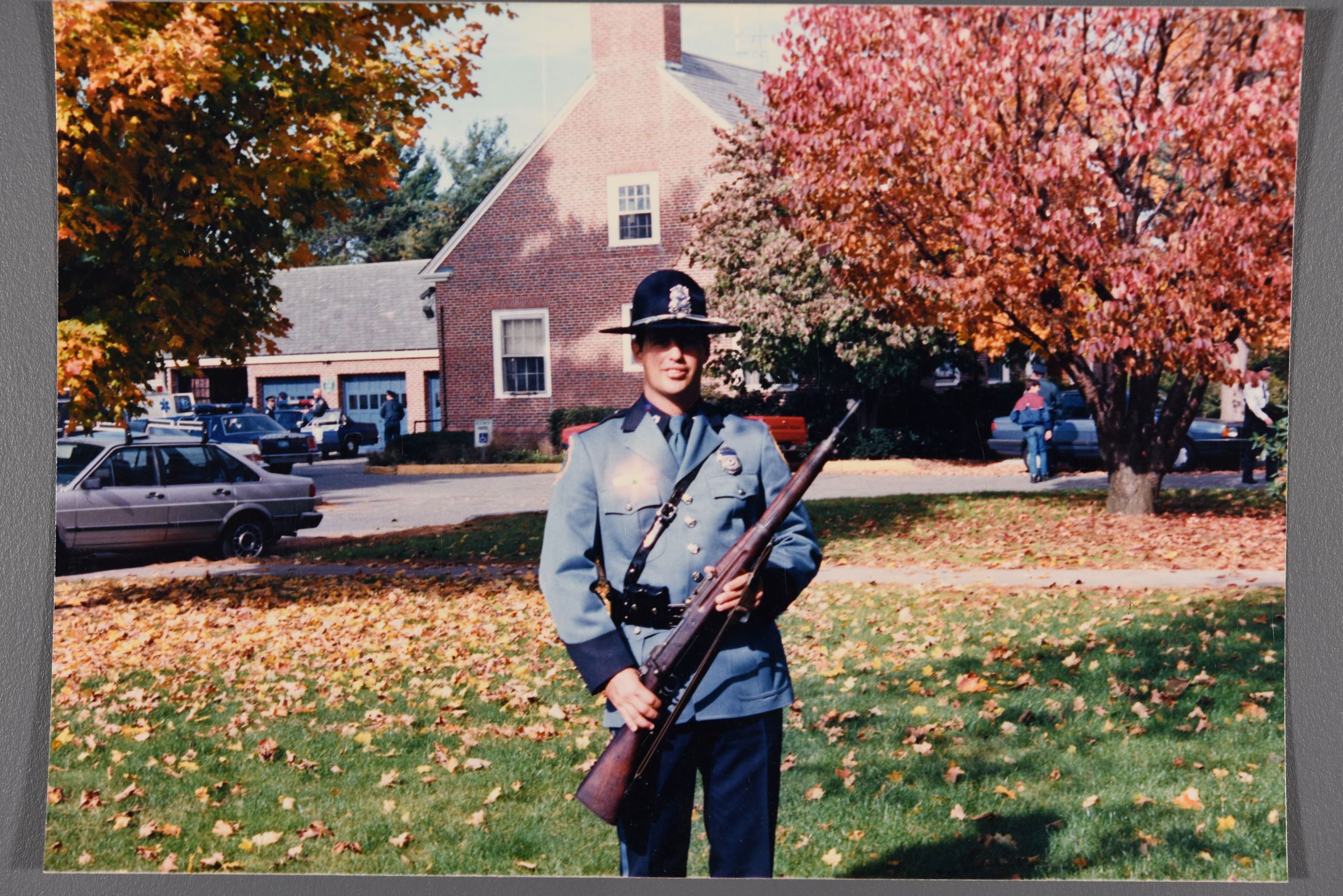 Officer Jim Amalfi on the Honor Guard in the original uniforms by the old police station building.